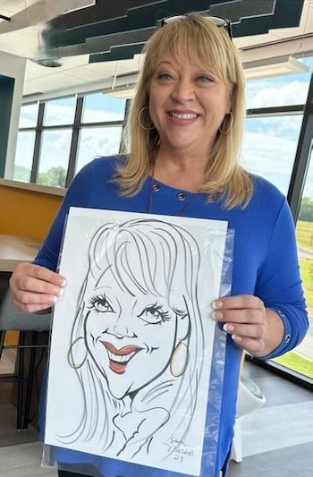 Caricature drawing of young women by Susan of Atlanta